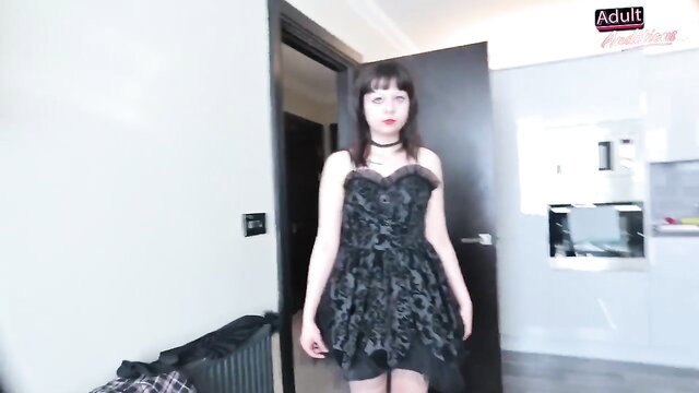 Goth teen in black lace dress stands seductively in doorway, truth or dare heat