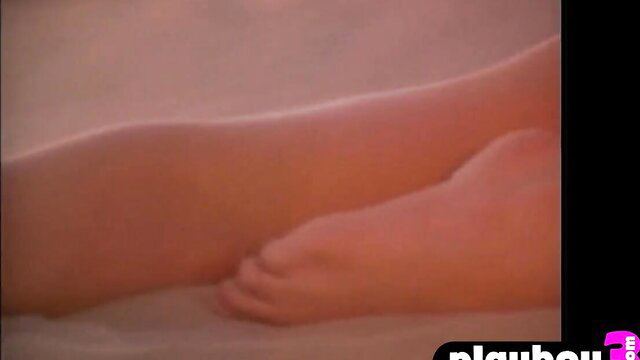 Alluring cougar model teases with stunning legs and feet closeup