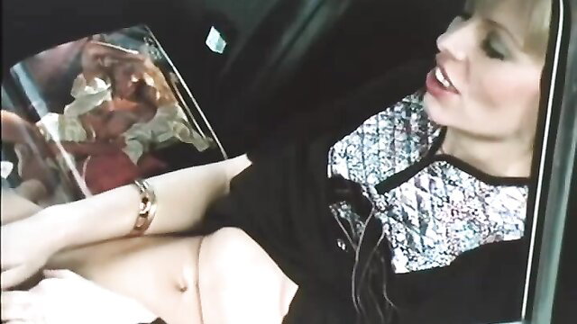 Blonde in car flashes pussy, holds dildo in Ribu retro porn