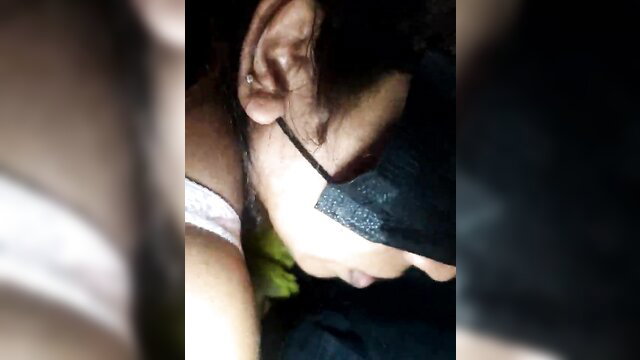 Blurry closeup of masked Sri Lankan wife in lingerie, sensual tease