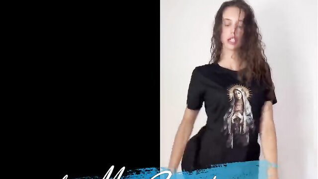 Curvy brunette in Virgin Mary t-shirt teases with wet lips and pose