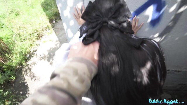 Martin Gun fucks long-haired Asian beauty against graffiti wall outdoors