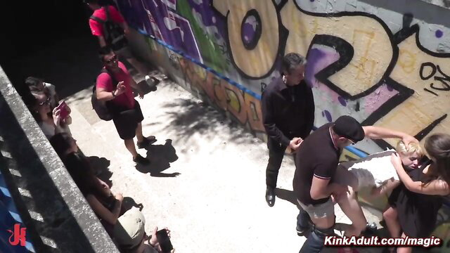 Bound blonde fucked publicly at subway entrance by men