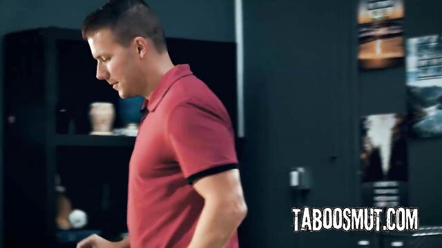 Christy Love in red polo shirt, fit athletic man profile view