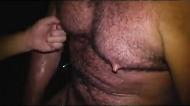 Hairy muscular daddy chest grabbed by small hand in outdoor gay wank