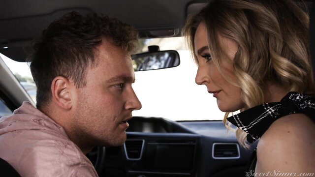 Reagan Foxx closeup in car with man, tense eye contact