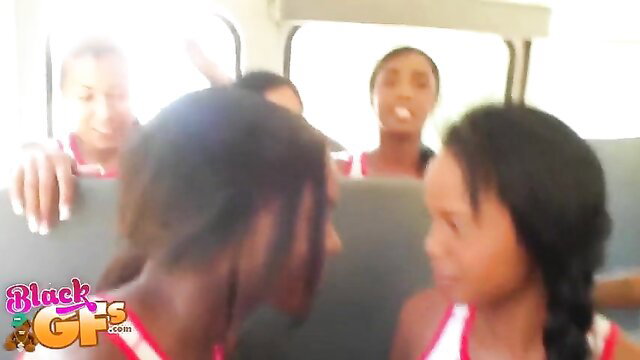 Horny black teen cheerleaders in uniforms getting wild on bus