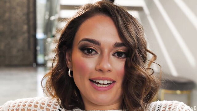 Sophia Burns smiling in sexy lace top closeup