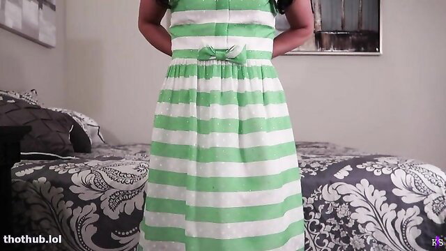 Black wife in sexy green striped dress, teasing cuckoldress pose