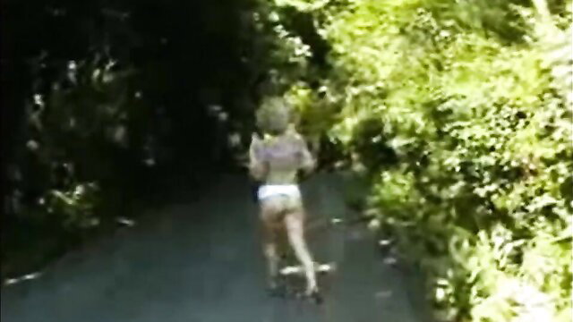 Wild British blonde flashing pussy & ass while running outdoors