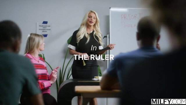 Blonde MILF teacher lectures class in tight black dress on MILFY
