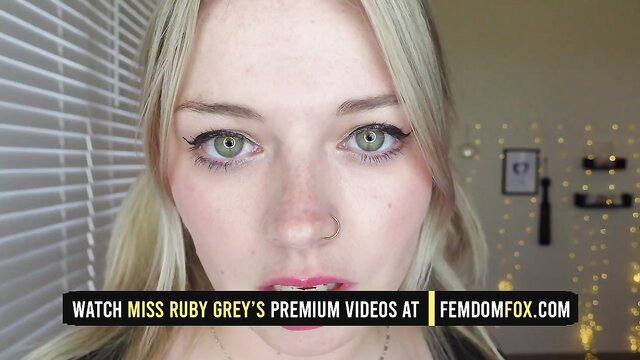 Miss Ruby Grey's seductive green eyes tease in premium femdom video