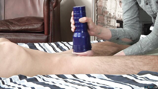 Sweet young Luca tied down, Fleshlight handjob on bed at Love Trans Sex