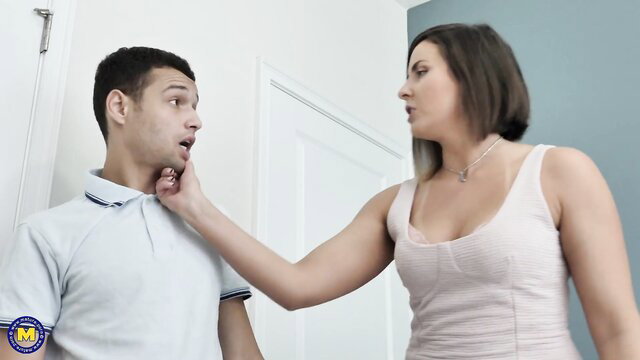 Busty stepmom grabs virgin stepson's face in tense taboo moment