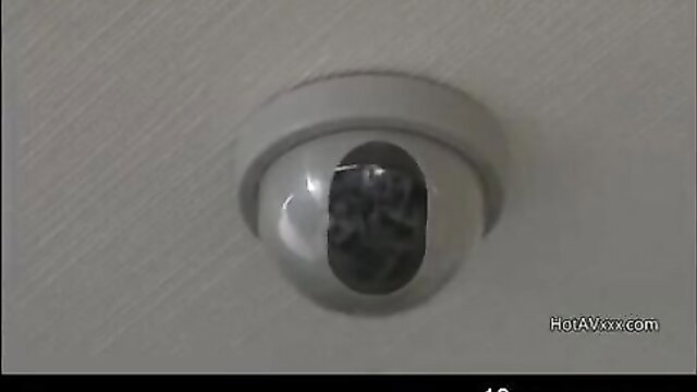 Security camera spying on office lady fucking