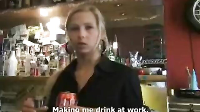 Veronika Czech Streets blonde bartender holding beer can at bar