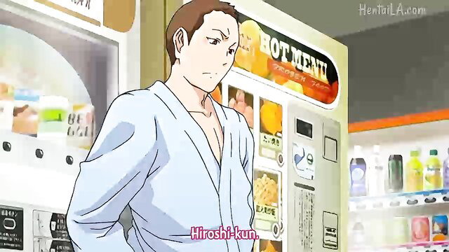 Japanese man Hiroshi-kun in white robe at hot menu vending machine