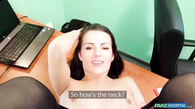 Brunette spreads legs topless on desk for doctor exam