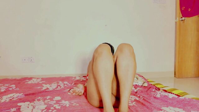 Two women kneeling nude on bed, legs spread, asses exposed in threesome preview