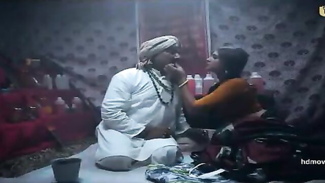 Indian couple intimate kiss in traditional attire, Ullu Red Light web series