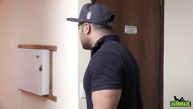Muscular Arab guy in cap and polo checks out door in hot teaser