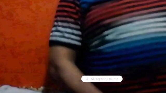 Chubby Argentinian amateur mom in striped shirt squeezing huge tits