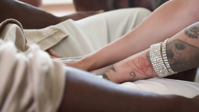 Kitana Montana sexy legs tattoos bangles on bed