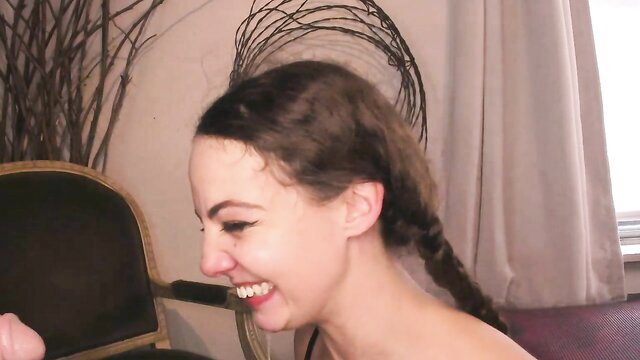 Brunette with braid smiles topless, happy tears from intense facefuck