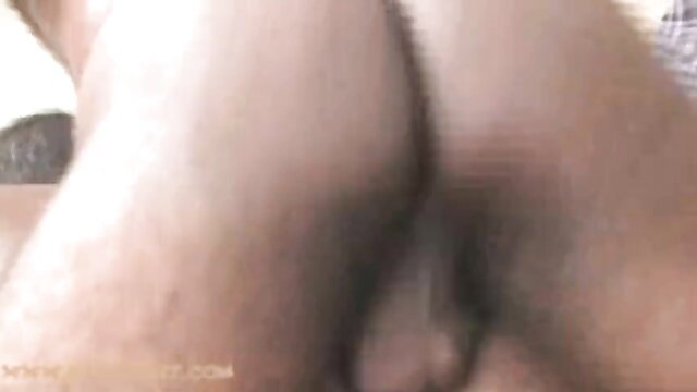 Closeup of black man's huge erect cock and balls in explicit solo view