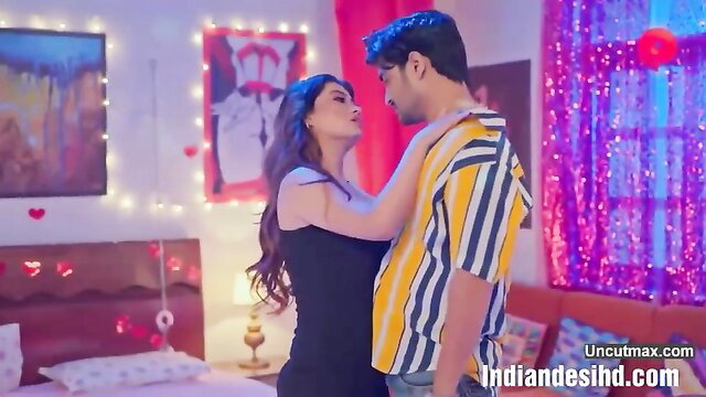 Indian couple in black dress embracing passionately in Madhushala Episode 7