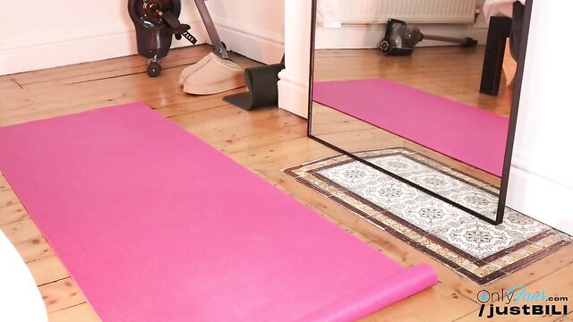 justbecauseiloveit young model on pink yoga mat in room
