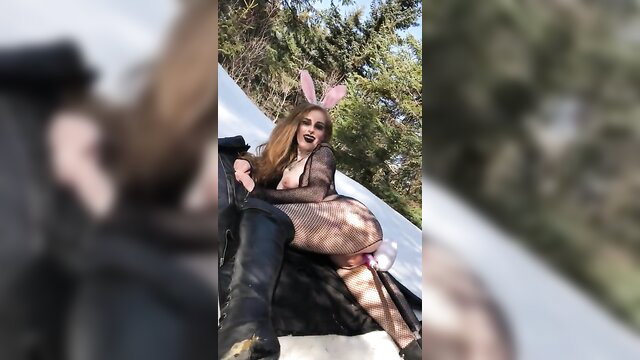 Tieduptart as sexy bunny in fishnets and boots on car hood