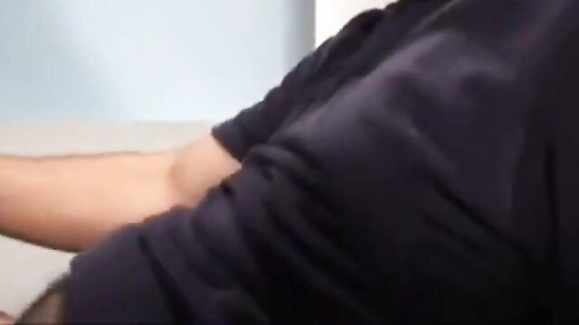 Man in black shirt grabs arm in intense adult threesome scene