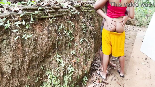 Neha Bhabhi groped from behind by friend in yellow shorts outdoor