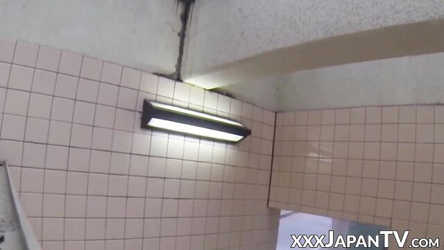 Pretty Japanese girl in tiled public restroom, Sex Japan TV