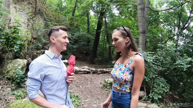 Hot couple flirts outdoors, guy with red rose, passionate sex ahead