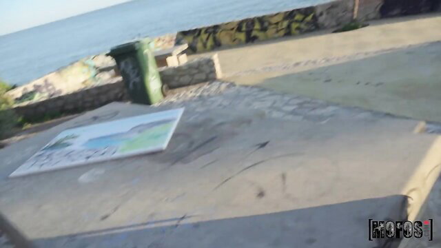 Sasha Coxx alluring POV tease by sea graffiti wall