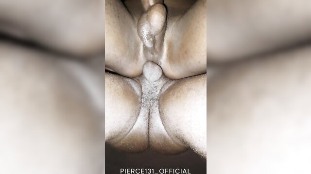 Closeup of woman's shaved pussy and ass spread wide open