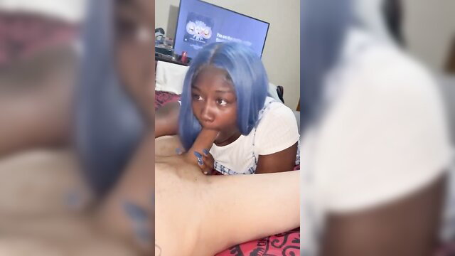 Blue-haired black teen girlfriend sucking BBC closeup in bed amateur