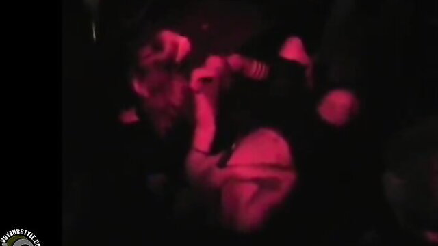 Blurry red-lit stage blowjob with singer and slutty fan