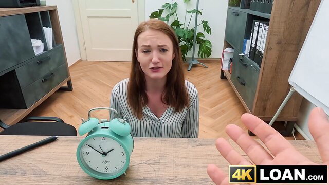 Olivia Westsun worried redhead in office with alarm clock Loan4K