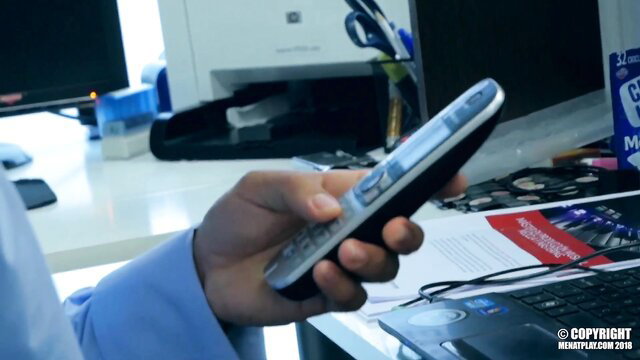 Man holding remote in office, trans sex thumbnail mishap