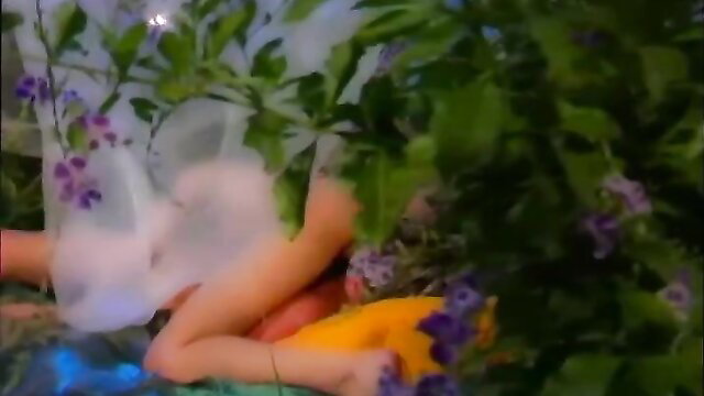 Taylor Rain nude in lush garden, ass up outdoor tease