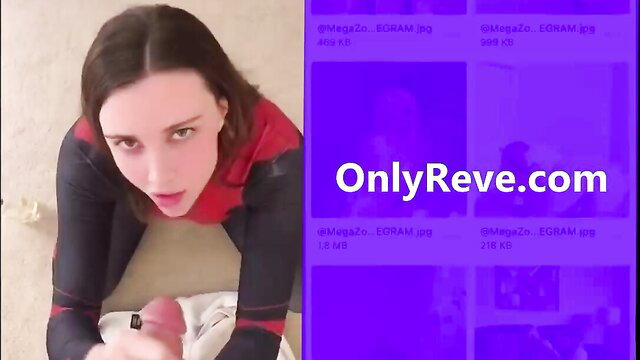 Hot teen in red top kneels giving handjob facial cumshot