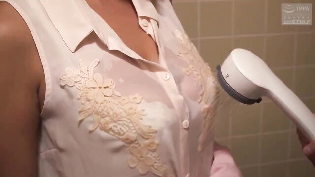 Japanese mom in wet blouse using lint roller on breasts teaser