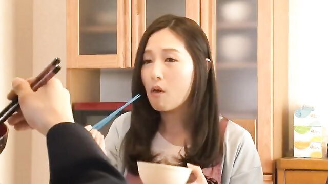 Aki Sasaki as stepmom fed noodles by hand in kitchen JAV scene