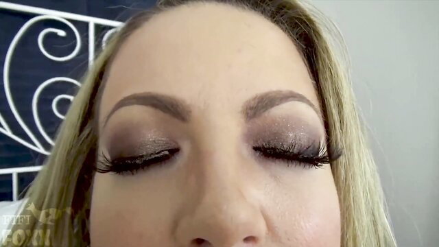 Carmen Valentina closeup smoky eyes blonde MILF makeup