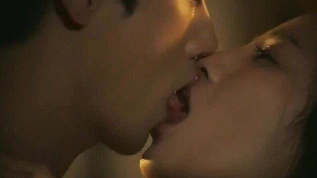 Hot Korean couple intense tongue kissing closeup