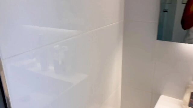 Hot babe interrupts guy in bathroom for blowjob and facial cumshot