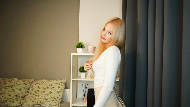 Mirianscorgie shy blonde camgirl in tight white top and skirt